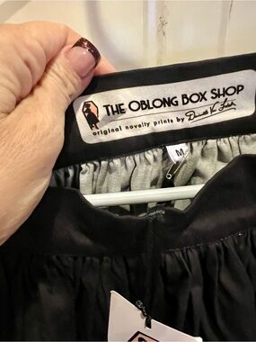 The Oblong Box Shop Women's Black Skirt - Tiki swap head with piranhas